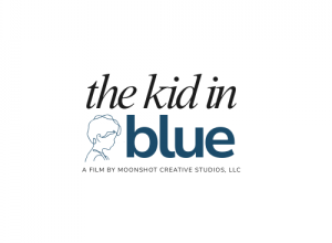 Black Font:  "The Kid in" the word "Blue" in color blue  with outline of a kid side profile in color blue